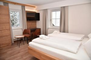 Postel nebo postele na pokoji v ubytování Katschbergstub'n