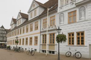 a group of bikes parked in front of a building at Hotel Borchers in Celle