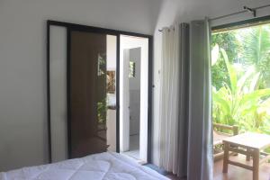 Balkón nebo terasa v ubytování Bay de Emmanuel Rooms