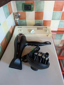 a sewing machine sitting on top of a counter at Openspace Attic Apartment with terrace, Wi-Fi in Saronno