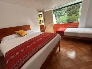 En eller flere senge i et værelse på Hotel all sur + 21 billeder