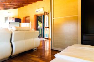 Ένα ή περισσότερα κρεβάτια σε δωμάτιο στο Openspace Attic Apartment with terrace, Wi-Fi