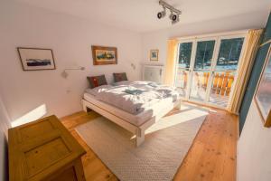 Ένα ή περισσότερα κρεβάτια σε δωμάτιο στο Casa Nonna