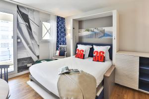 Postel nebo postele na pokoji v ubytování Résidence Pierre & Vacances La Baie des Sables