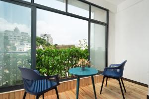 Balkón nebo terasa v ubytování Sanya Weilan Homestay - Dadonghai Luhuitou Scenic Area Branch