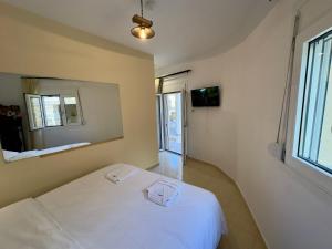 Ένα ή περισσότερα κρεβάτια σε δωμάτιο στο Aski house - Authentic Cretan life