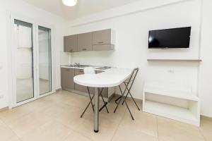 TV a/nebo společenská místnost v ubytování Ungaretti Resort