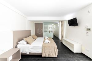 Postel nebo postele na pokoji v ubytování Ungaretti Resort