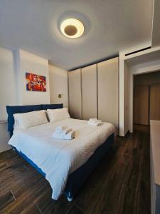 Postel nebo postele na pokoji v ubytování Melo Exclusive Suite 149