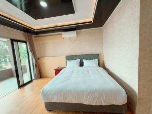 En eller flere senge i et værelse på Rodeo Inn + 3 billeder