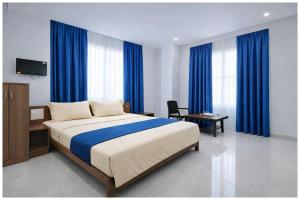 Postel nebo postele na pokoji v ubytování Hotel Nagendra Residency Near Jagannath Temple & Sea Beach - Fully Air conditioning- Free Wi-fi and Room Service- Best Premium Hotel In Puri