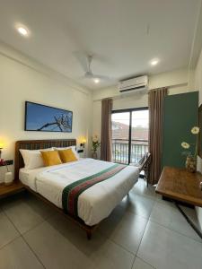 Voodi või voodid majutusasutuse Creek Harbour Fort Kochi toas