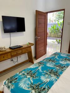 Μια τηλεόραση ή/και κέντρο ψυχαγωγίας στο Villa Tenang Legian