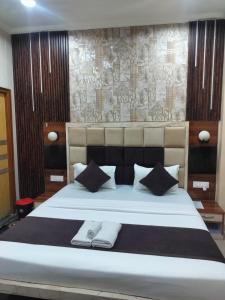 Giường trong phòng chung tại The Five D