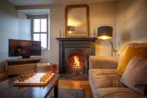 Posezení v ubytování Dunvegan Castle The Farmhouse Cottage