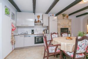 Η κουζίνα ή μικρή κουζίνα στο Haus in Istrien direkt am Meer