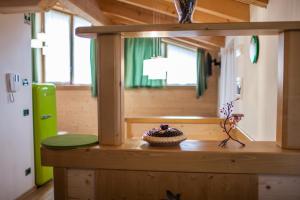Fotografie z fotogalerie ubytování Albergo Diffuso Dolomiti v destinaci Forni di Sotto + 37 fotografií