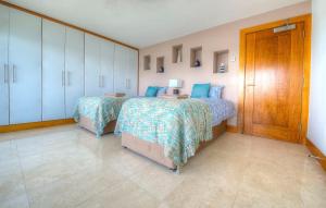 Ένα ή περισσότερα κρεβάτια σε δωμάτιο στο Tur an Tsaile - Galway Lakeside Apartments