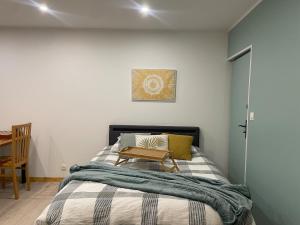 En eller flere senge i et værelse på Studio + 2 billeder