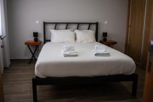 En eller flere senge i et værelse på Recanto da Boucinha - T3 + 23 billeder