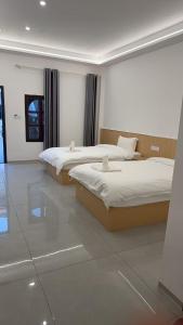 Ένα ή περισσότερα κρεβάτια σε δωμάτιο στο 崇安精品酒店