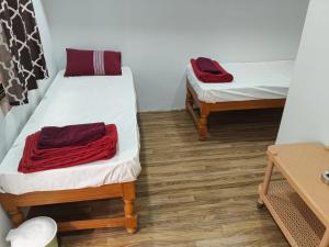 Giường trong phòng chung tại MR Lodge