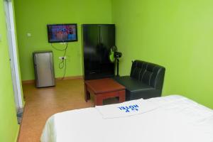 TV a/nebo společenská místnost v ubytování Global Hotel