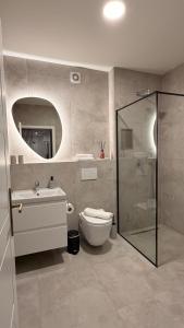 Et badeværelse på Luxury Downtown Apartment Bratislava