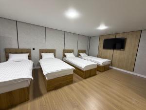 Postel nebo postele na pokoji v ubytování Town House