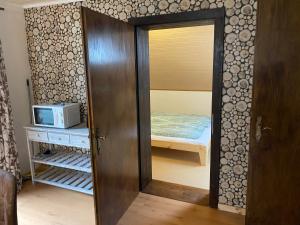 Ένα ή περισσότερα κρεβάτια σε δωμάτιο στο Ferienwohnung Gletscherblick