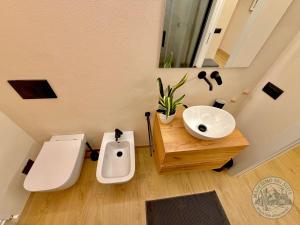 Koupelna v ubytování Madesimo Ski Suite + 13 fotografií