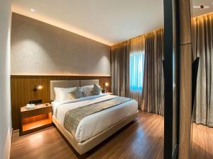 Voodi või voodid majutusasutuse Aamodh toas