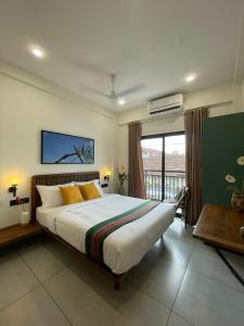 Voodi või voodid majutusasutuse Creek Harbour Fort Kochi toas