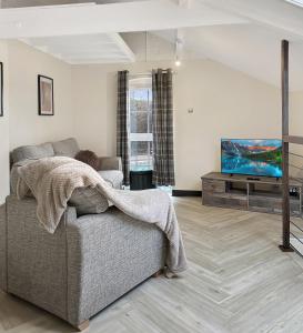 TV a/nebo společenská místnost v ubytování Sleeps 4, 2 Bedroom Maisonette in Central Grantham