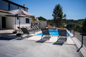 Swimmingpoolen hos eller tæt på Recanto da Boucinha - T3