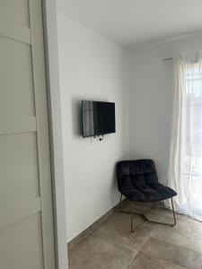 Μια τηλεόραση ή/και κέντρο ψυχαγωγίας στο Villa Catherine +8 φωτογραφίες