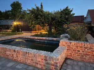 Bazén v ubytování Alwine - Landhaus an den Spreewiesen nebo v jeho okolí