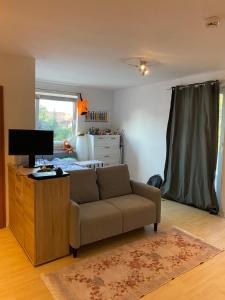 Et opholdsområde på cosy studio apartment good location