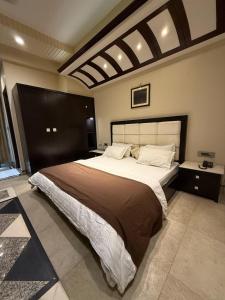 En eller flere senge i et værelse på Virasat Haveli