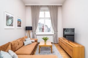 TV a/nebo společenská místnost v ubytování Venetian House Market Square Aparthotel