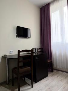 Et tv og/eller underholdning på Hotel New Terrace