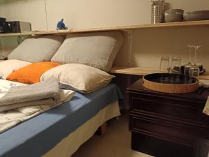 En eller flere senge i et værelse på CityMini Camping