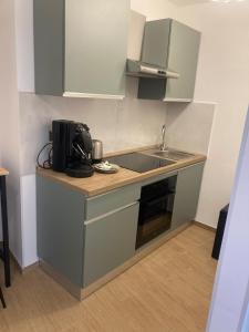 Η κουζίνα ή μικρή κουζίνα στο Elegant R&B Floridia +10 φωτογραφίες