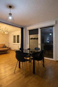 Posezení v ubytování Appartement confortable N1 à Saint-Louis, proche Basel&Allemagne