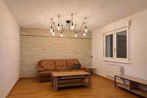 Posezení v ubytování Appartement confortable N1 à Saint-Louis, proche Basel&Allemagne