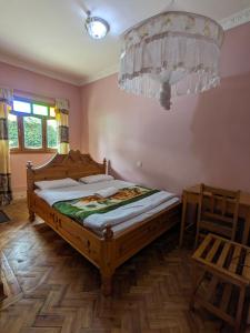 Giường trong phòng chung tại Bethlehem Lodge