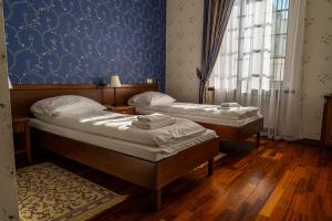 Postel nebo postele na pokoji v ubytování Zamek Przecław