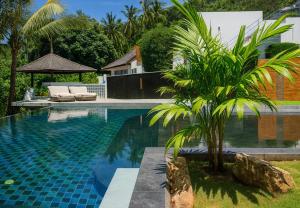 Swimmingpoolen hos eller tæt på Seaview Bliss 2BR with Balcony Paradise Apartment