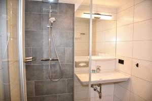 Koupelna v ubytování Katschbergstub'n + 18 fotografií