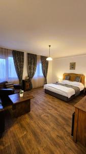 Postel nebo postele na pokoji v ubytování Vintage H&R St Anna